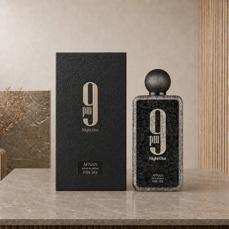 Black Afnan 9PM Night Out box and 100ml Extrait de Parfum bottle shown side by side from the front.