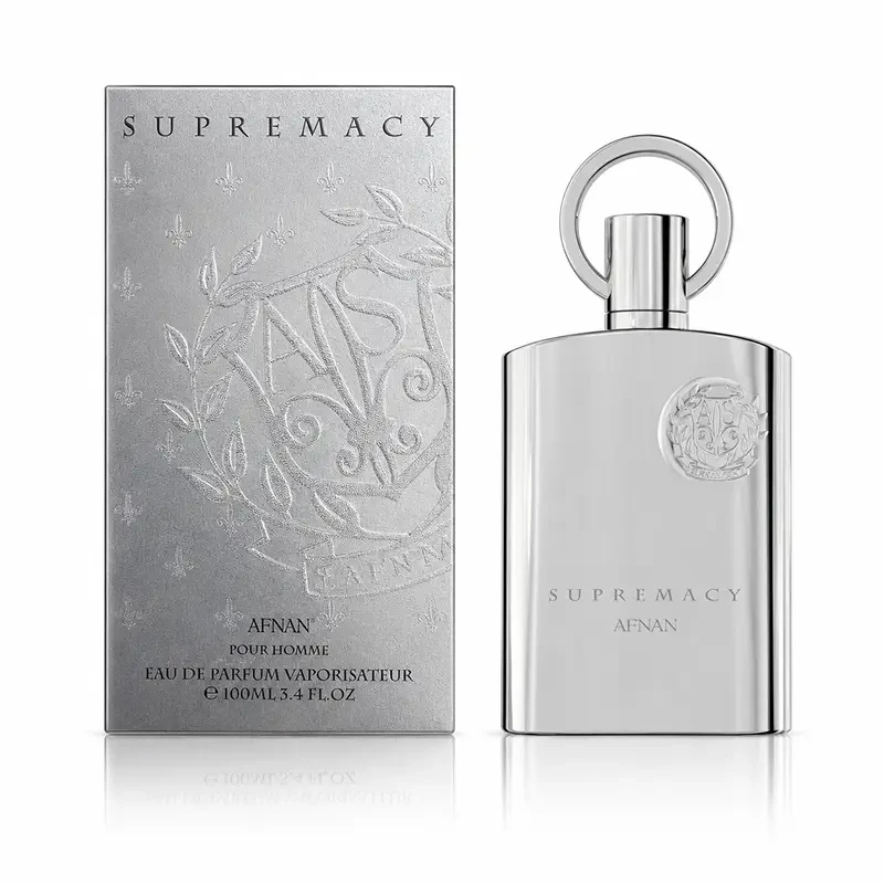 Afnan Supremacy Silver 100ml bottle and embossed box appear on white with soft shadows and reflections
