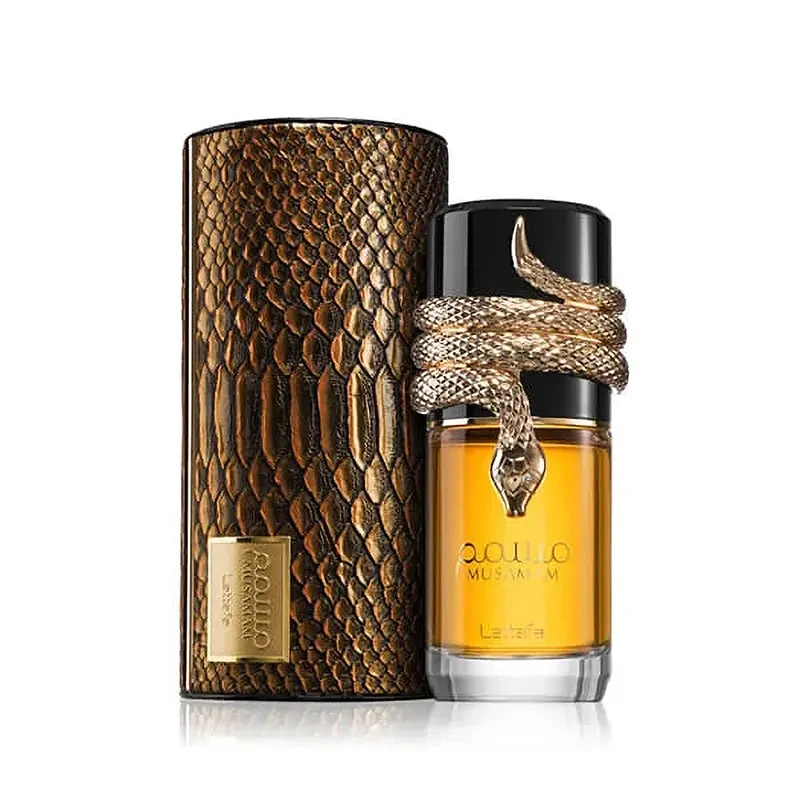 Distinctive black and gold Musamam bottle presented with its textured collector packaging.