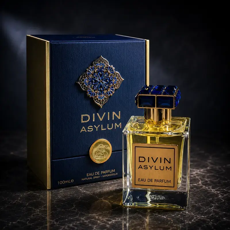 Premium inner packaging and parfum bottle display of Divin Asylum with refined gold detailing.