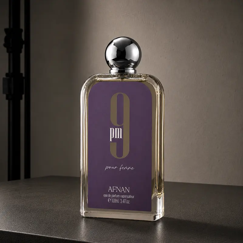 Sleek purple bottle design of Afnan 9 PM Pour Femme, showcasing refined European luxury styling.