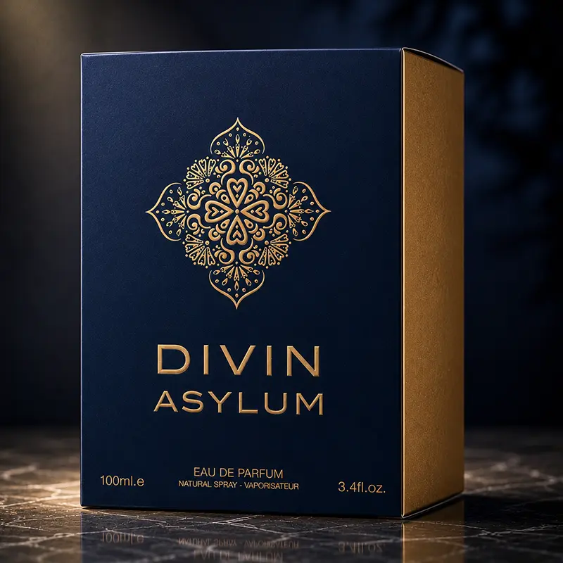 Closeup of Divin Asylum luxury parfum box with embossed gold branding and premium finish.