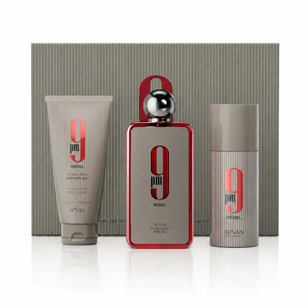 Complete Afnan 9PM Rebel gift set arranged in front of its presentation box