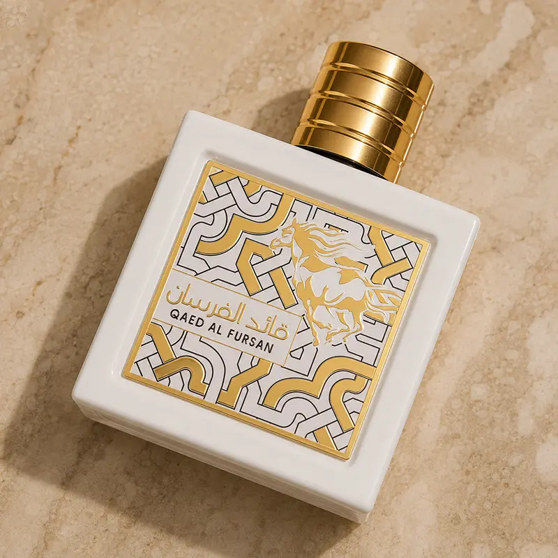 Luxury top angle showing the gold metallic cap and geometric bottle artwork detail.