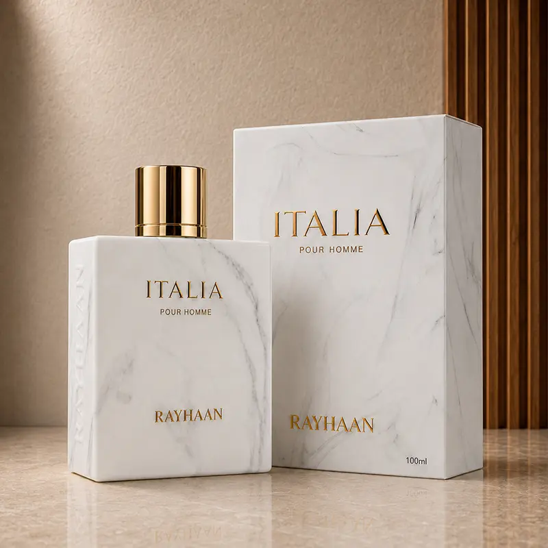 Rayhaan Italia bottle and 100ml box shown at an angle on a warm neutral studio surface.
