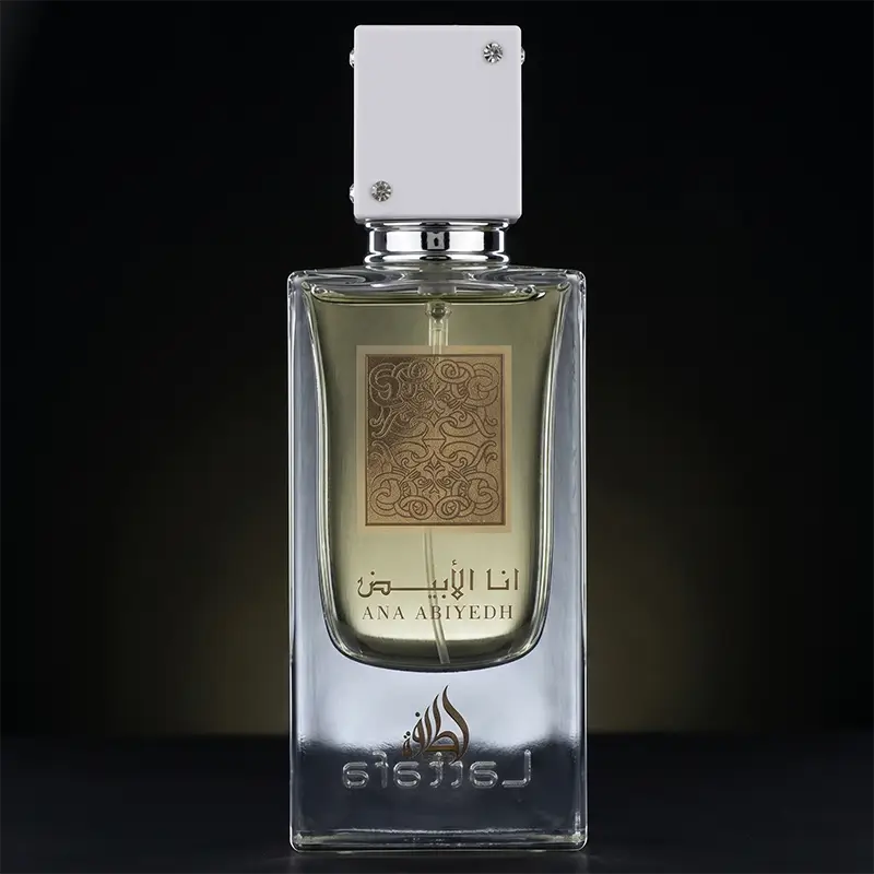 Close-up of the elegant Ana Abiyedh glass bottle with gold label and white square cap accented with crystals.