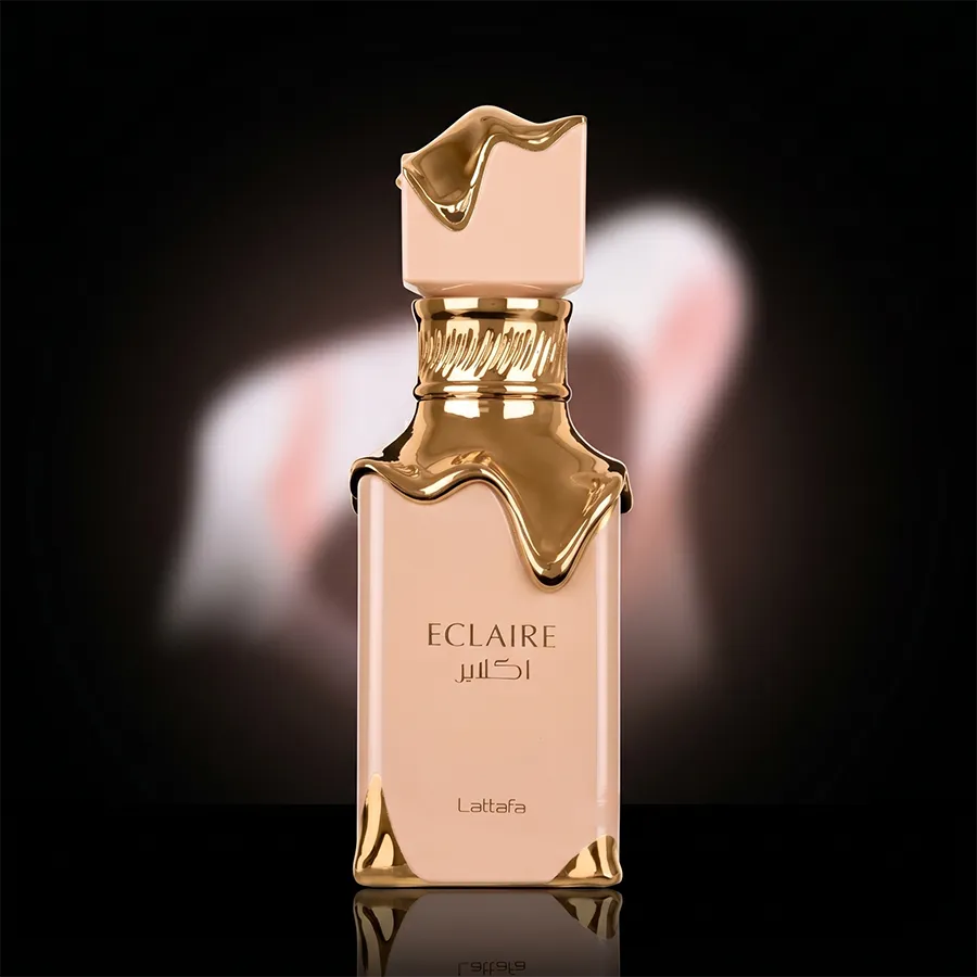 Elegant 100ml bottle of Lattafa Eclaire Eau de Parfum for women with signature gold melting luxury detail.