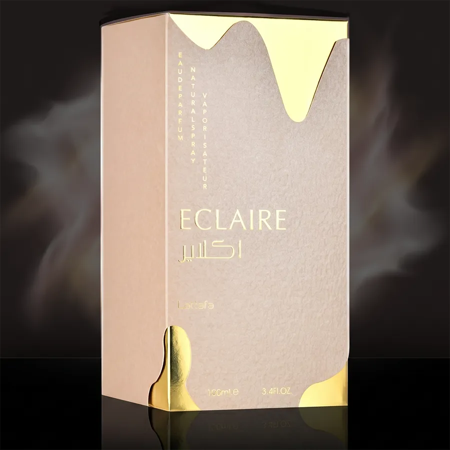 Original packaging box of Lattafa Eclaire EDP for women showing authentic gold embossed luxury design and 100ml size.