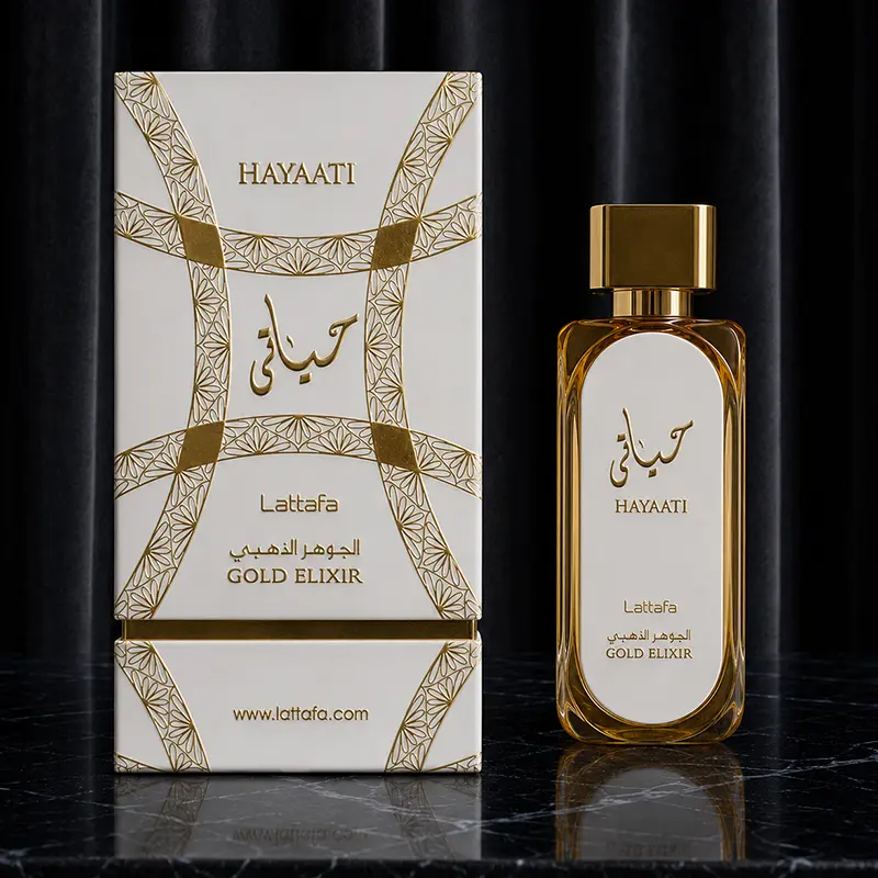 Lattafa Hayaati Gold Elixir bottle and box displaying a woody aromatic Eau de Parfum composition