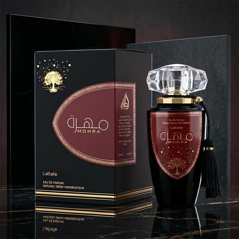 Authentic Lattafa Mohra Unisex perfume 100ml bottle displayed next to its premium black and gold luxury packaging.