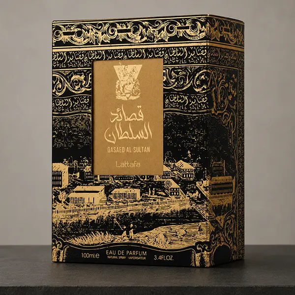 Closeup of the intricately embossed Lattafa Qasaed Al Sultan black and gold luxury packaging with premium detailing.