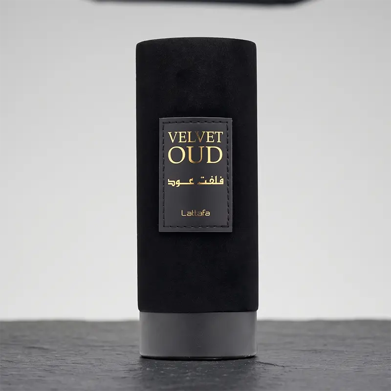Detailed view of the black suede packaging design for Lattafa Velvet Oud with metallic gold branding.