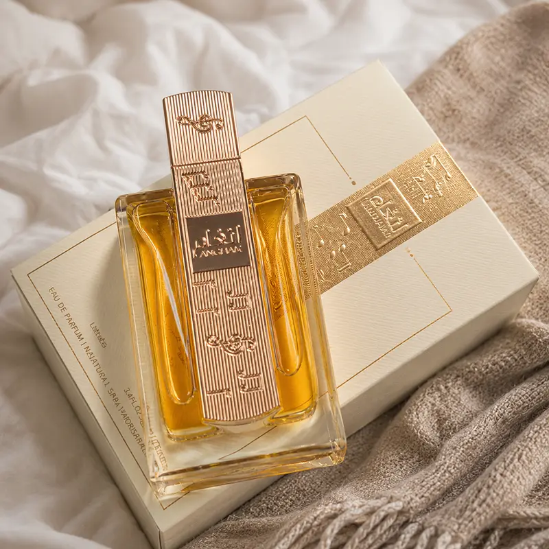 Lattafa Angham original luxury perfume resting on a textured blanket creating a warm and exclusive atmospheric mood.