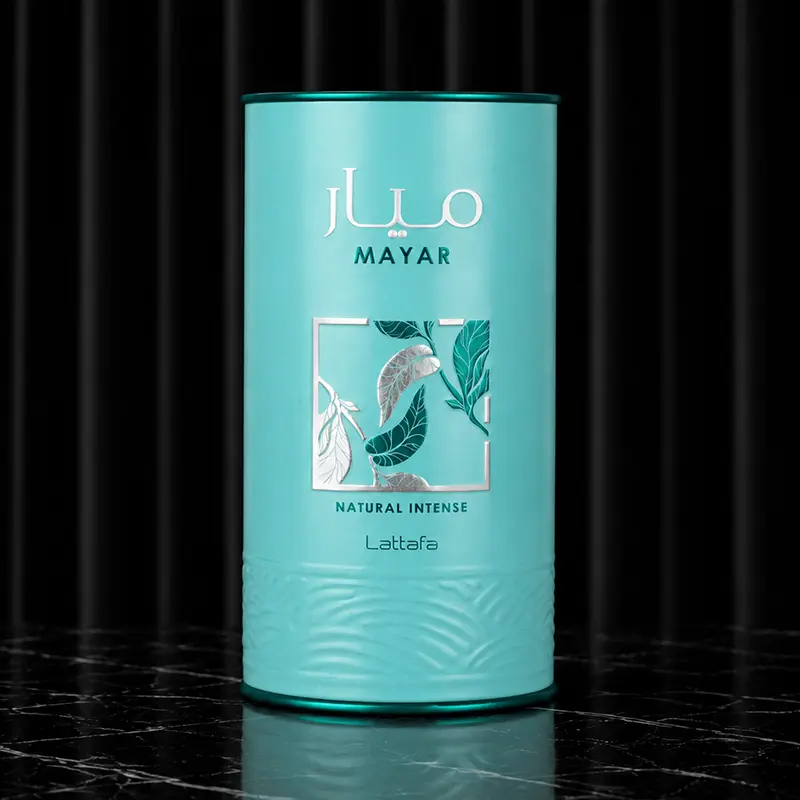 Turquoise Mayar Natural Intense cylindrical box with leaf artwork and an embossed lower pattern