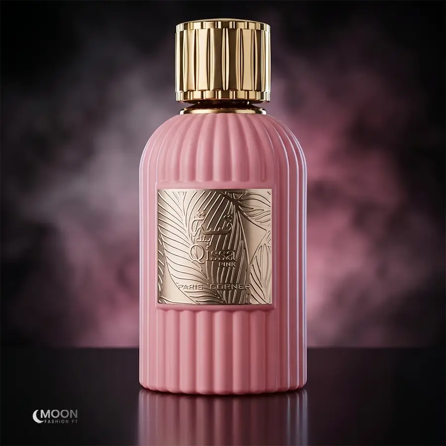The elegant pink ribbed bottle of Qissa Pink for women features a luxury gold cap and leaf-embossed front plate.