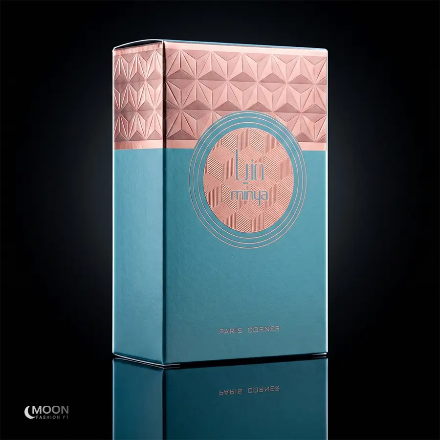 Detailed view of the embossed teal and gold box for Paris Corner Minya, an exquisite unisex perfume.